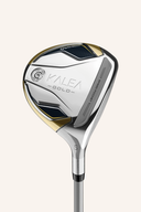 TaylorMade Kalea Gold Fairwayholz, modernes Golfholz mit goldener Lackierung und ergonomischem Griff, auf Rasen liegend.