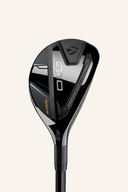 TaylorMade Qi10 Rescue Hybrid Golfschläger, Nahaufnahme des Schlägers mit schwarzem Griff und goldener Schlagfläche