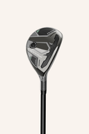 Hybridschläger TaylorMade Qi35 Max Hybrid mit schwarzem Schlägerkopf und grünem Griff, Nahaufnahme des Schlägerkopfs.