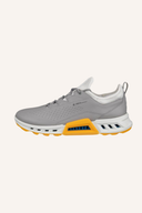Ecco Biom C4 Golfschuhe aus Leder mit griffiger Sohle, bequemes Design für Damen und Herren, weiße und grüne Details.