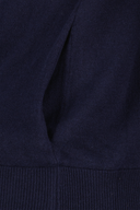 Jack Nicklaus Wind Stopper Pullover Jacke, sportliche Outdoor-Bekleidung mit winddichter Textur, in dunkler Farbe.