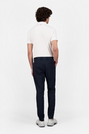 Lange Golfhose von J. Lindeberg, atmungsaktiv und bequem, in neutralem Farbton, passend für sportliche Aktivitäten.