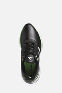 Adidas Solarmotion 24 Golfschuhe, spikeless Golfschuhe mit grünem Design und rutschfester Sohle auf hellem Hintergrund