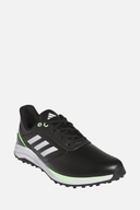 Adidas Solarmotion 24 Golfschuhe, spikeless, bequeme Golfschuh mit nachhaltigem Design, auf dem Bild in Schwarz mit grünen Akzenten.