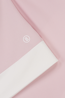 Alysha Poloshirt von Bogner, grünes Polo mit Kragen und kurzen Ärmeln, aus weichem Material, auf einem weißen Hintergrund.