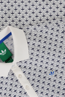 Polo à motif trèfle intégral