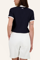 J. Lindeberg Izara Polo, dunkelblaues Poloshirt aus Baumwolle mit Kragen und Knopfleiste, sportlich und modisch für Damen
