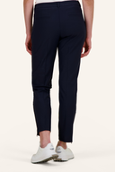 Lange J. Lindeberg Pia 7/8 Golfhose in dunklem Stoff, elastisch, mit geradem Schnitt und Gürtelschlaufen.
