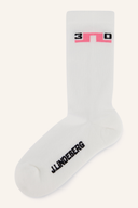 Bunte Kameron Socken von J. Lindeberg, bequem und stylisch, mit bunten Mustern, auf weißem Hintergrund sichtbar.