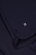 Damen Poloshirt von Daily Sports mit Rüschen-Details, in hellem Farbton, aus weichem Material, auf einem weißen Hintergrund.