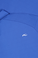Kjus Savin Structure Polo in grau, bequemes Poloshirt mit strukturierter Oberfläche, für sportlichen und eleganten Look.