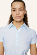 J. Lindeberg Caitlyn Polo, beiges Poloshirt aus Baumwolle mit Knopfleiste und Kragen, modisches Design für Damen.