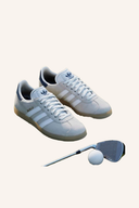 Adidas Gazelle Golfschuhe aus Leder mit grün-weißen Akzenten, seitliche Branding und rutschfeste Sohle.