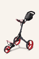 Schwarzer Big Max IQ² Golf-Trolley, manuell, mit Griff und Rädern, auf glattem Boden abgestellt.