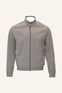 Reversible Jacke von Jack Nicklaus in Grau, mit sportlichem Design und warmem Innenfutter, sichtbar auf dem Bild.