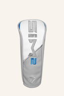 Grauer Golfschläger-Kopfschutz mit blau-weißem Design und TaylorMade-Logo