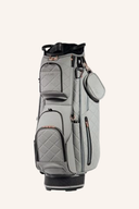 JuCad First Class Cartbag für Golf, mit mehreren Fächern und gepolsterten Griffen, auf einem Golfwagen liegend