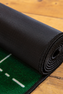 Große Putt-Trainingsmatte von PuttOUT, ideal für präzises Putten im Heimtraining, mit weicher Oberfläche und Zielmarkierungen.