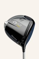 TaylorMade Qi10 Max Driver, moderne Golfschläger mit aerodynamischem Design und schwarzen Details, auf einem Golfplatz liegend.
