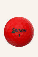 Rote Srixon Soft Feel Golfbälle, Nahaufnahme der Bälle mit weicher Oberfläche, ideal für ein angenehmes Spiel.