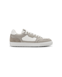 Graue Goatlane The Contour Golfschuhe für Damen mit sportlicher Sohle und bequemer Passform auf grünem Golfplatz.