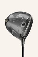 TaylorMade QI 35 Core Driver, Golfschläger mit schwarzem Schlägerkopf und grünem Griff, seitliche Ansicht.