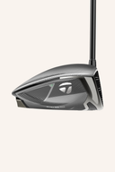 TaylorMade QI 35 Core Driver mit schwarzem Schlägerkopf und grünem Griff, seitliche Ansicht, detailreiche Darstellung
