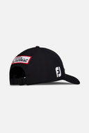 Schwarze Tour Performance Cap von Titleist, leichte Kappe mit gesticktem Logo, ideal für Golf und sportliche Aktivitäten.